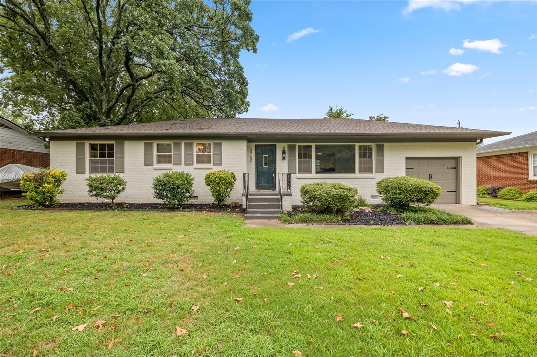 This charming 3-bedroom, 2-bathroom residence blends classic charm with modern convenience, featuring original wood flooring that exudes warmth and character. Step into the remodeled kitchen, where an open floor plan creates an inviting space perfect for entertaining, complete with newer energy-efficient appliances that make cooking a delight. The bathrooms have been tastefully updated with elegant, modern finishes, and stylish new light fixtures brighten the home throughout, creating a welcoming ambiance. You'll find peace of mind with key components recently updated, including a new garage door, electrical panel, water heater, and state-of-the-art HVAC system, ensuring comfort and efficiency. Outside, the freshly painted exterior gleams, complemented by a brand-new roof and side eaves, adding to the home's curb appeal and integrity. This meticulously maintained gem is not just a house but a home where memories are waiting to be made.