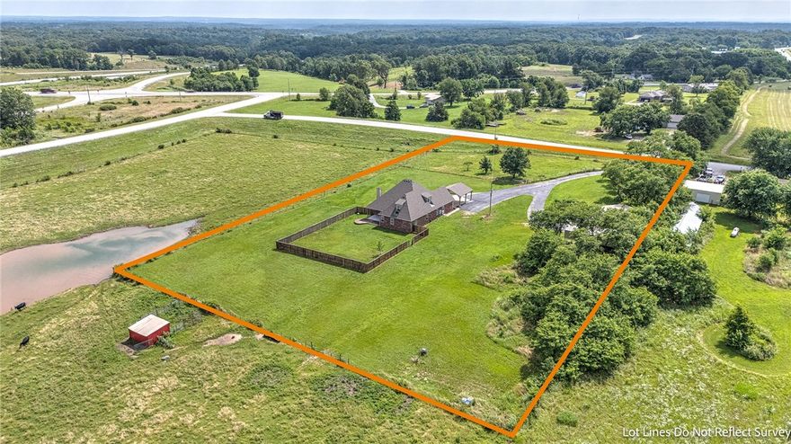 Come see this estate escape in Bentonville! This home has 6 bedrooms, and 4.5 bathrooms with over 3600 square feet to enjoy! Three options for primary bedroom suites/ensuites, with the newest remodel being upstairs. Some additional things to note are the large closets, generator hookup capability, public water, all electric, kitchen remodel and upstairs remodel 2019, wood burning fire place,  huge attic walk in storage, new survey and so much more to see!  To make this home even more appealing there are 3 flat acres included, along with a large 30X50 shop, and RV parking space and hookups. Looking for peaceful living, but close to I-49 and everything local just minutes away?! This is it! Check out the potential of making this large home yours, enjoying the sunset dinner views, and tinkering around your very own private shop.