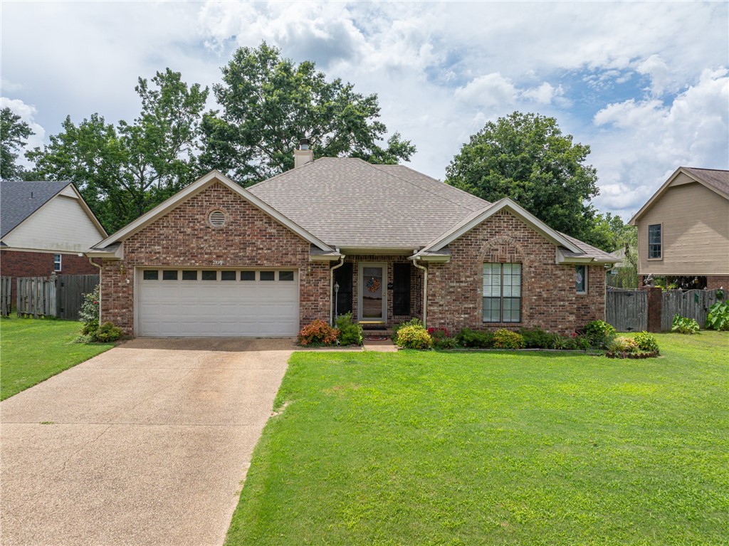 Welcome home to this well-maintained 3-bedroom, 2-bath home offering 1,696 sqft of family-friendly living in a quiet neighborhood with access to Fort Smith & Northwest Arkansas. The open floor plan is ideal for daily living & entertaining, with a spacious living room featuring a gas fireplace & a dining area that flows into the kitchen. The kitchen includes bar seating—great for quick meals or homework—and the refrigerator stays! Washer & dryer included, making it move-in ready. Families will love the split floor plan, offering privacy for the primary suite, which includes dual sinks, a walk-in shower & a walk-in tub. Touches throughout include crown molding, plantation shutters & a Ring doorbell for added security. The 2-car garage offers space for parking & storage. Step outside to your backyard retreat—landscaped with flowers, a covered patio with swing & a tornado shelter to help keep loved ones safe. A perfect blend of comfort, safety & convenience—this home is ready for your family to move in & make memories!