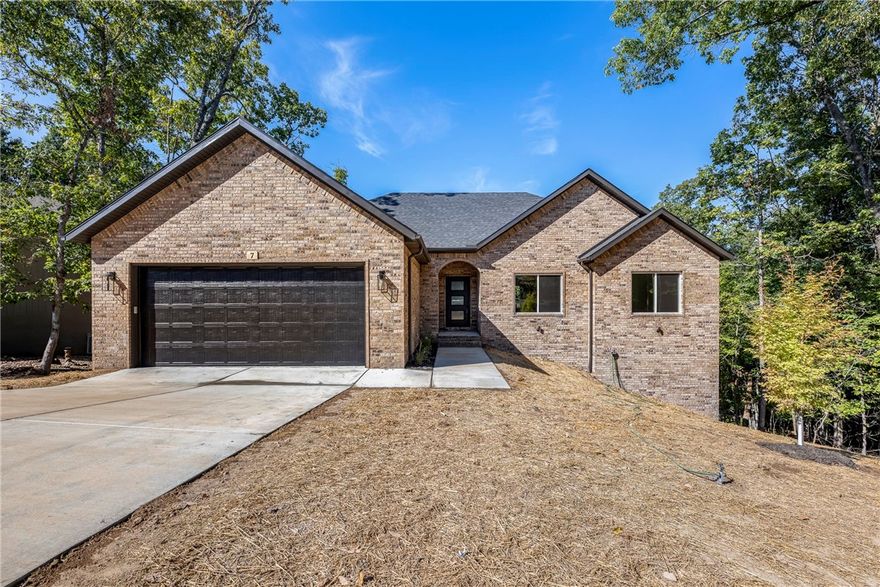 Beautiful New Construction by Elite Thomas Homes – Near the Back 40 Trails!
Don’t miss your chance to own this stunning new build by Elite Thomas Homes, just 0.3 miles from Back 40 trail access and 1.1 miles to Lake Ann. Enjoy an open-concept floor plan with vaulted ceilings, wood beams, and a stacked-stone gas fireplace. The spacious kitchen flows into the dining and living areas with access to a large covered and uncovered deck, perfect for entertaining.
The main level features 2 bedrooms, an office, 2 baths, and an oversized 2-car garage. The primary suite offers a walk-in closet and a spa-like bath with dual vanities, a tiled shower, a freestanding tub, and a separate toilet room for added privacy.
The partial walkout basement includes a media/game room with bar area, a 3rd bedroom with walk-in closet, full bath, and a second covered deck to enjoy the peaceful surroundings.