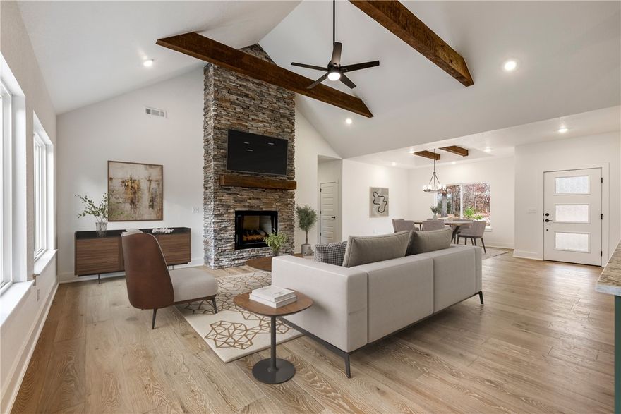 Beautiful New Construction by Elite Thomas Homes – Near the Back 40 Trails!
Don’t miss your chance to own this stunning new build by Elite Thomas Homes, just 0.3 miles from Back 40 trail access and 1.1 miles to Lake Ann. Enjoy an open-concept floor plan with vaulted ceilings, wood beams, and a stacked-stone gas fireplace. The spacious kitchen flows into the dining and living areas with access to a large covered and uncovered deck, perfect for entertaining.
The main level features 2 bedrooms, an office, 2 baths, and an oversized 2-car garage. The primary suite offers a walk-in closet and a spa-like bath with dual vanities, a tiled shower, a freestanding tub, and a separate toilet room for added privacy.
The partial walkout basement includes a media/game room with bar area, a 3rd bedroom with walk-in closet, full bath, and a second covered deck to enjoy the peaceful surroundings.