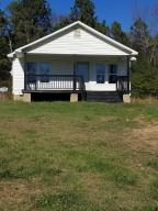 Just a few minutes North of town on HWY 103. This single family home features 1002 Square feet heated and cooled. 3 bed 1 bath configuration. It also has an open concept that sits on 1 acre of land M/S inside of the Clarksville School District.