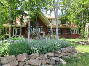 You'll want to pinch yourself every morning as you wake to a view from your bed, that incredibly captures your eyes. This French/Cottage Style home set in picturesque view of several mountains, valley and Illinois Bayou.Just minutes from Hwy.7 & I-40,this home built to save energy, boasts of TWO Geothermal units, Marvin windows, then more. *25-More-acres-available! Your dream home awaits you.