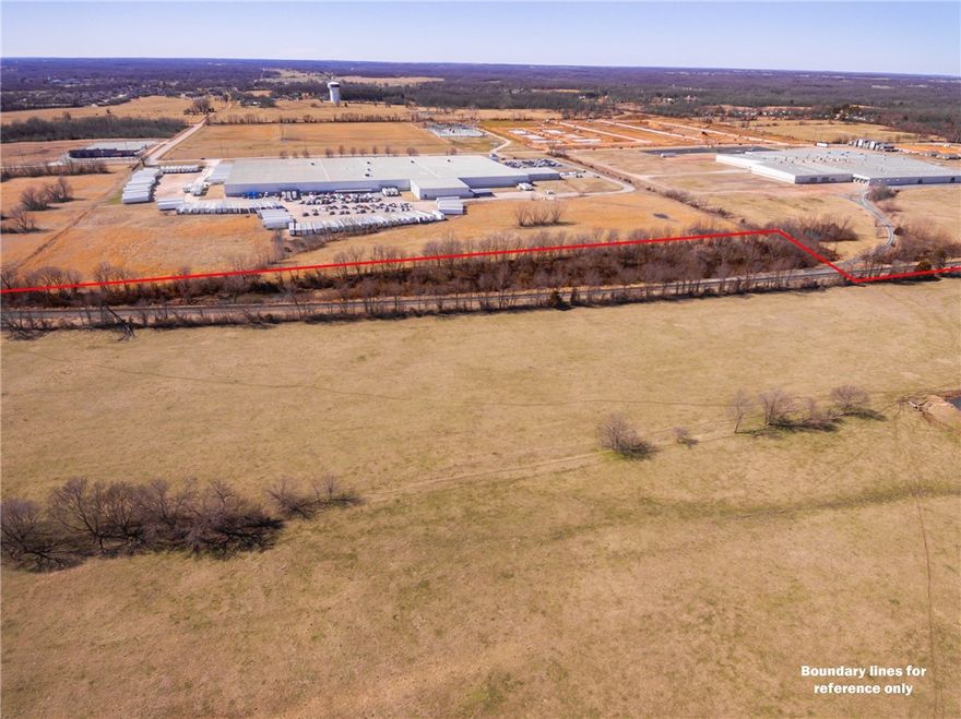 Excellent land, level and open with rail access. Located in the heart of Siloam Springs. Great opportunity area for a business or industrial development. Located less than 1/2 mile from pavement. Property can also be sold as two separate parcels. Water and Sewer are not on property. See ML # 1175120 for 45.11 acres and ML # 1175121 for 27.57 acres. Drone pictures coming soon.