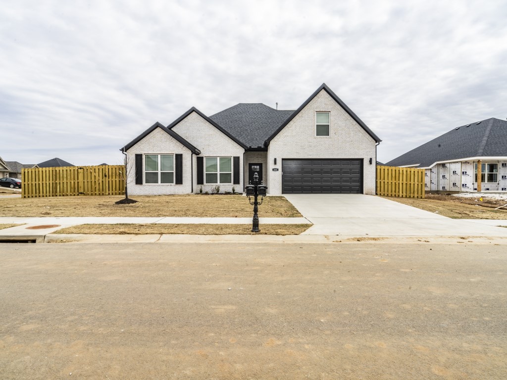 Looking for a newer home with close to 2000 sq. feet of living space? Amazing floor plan with an open concept, granite counter tops, pantry, ss appliance package and island bar. Situated on a large corner lot w/ privacy fenced yard. Luxury vinyl plank/tile through main areas, carpet in the bedrooms. Bonus room (or 4th bedroom) is located on 2nd level. Covered back porch area. All brick home.