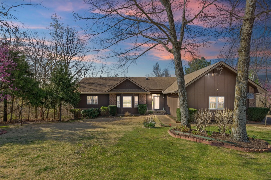 This home is perfect for a growing family, and anyone who loves to garden. There is a heated and cooled workshop in the basement. Great sunroom to enjoy the view of the woods. This home has a sprinkler. system for your gardens, and lawn. Features a partial home generator installed 2019. New window smoke detectors/carbon monoxide alarm.