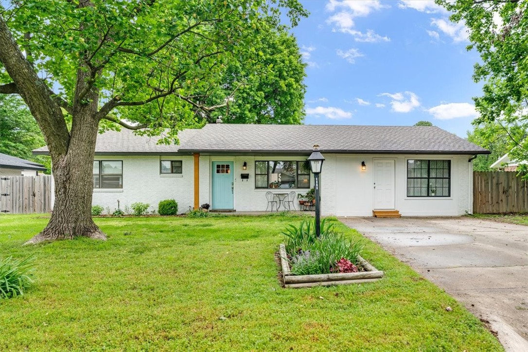 Welcome to this charming and thoughtfully updated 4-bedroom, 2.5-bath home in a quiet, established neighborhood off Johnson Road near Don Tyson Parkway. Built in 1973, the home features a brand-new roof (June 2025), fully updated kitchen and bathrooms, and real wood floors throughout the living areas—bringing warmth and timeless style.
Natural light floods the home through large windows, creating a bright and welcoming atmosphere. The fully fenced backyard is a standout feature, with mature trees, colorful landscaping, a thriving garden, and a storage shed. The front yard is just as inviting, with more mature trees and beautiful curb appeal.
Conveniently located just minutes from downtown Springdale, with quick access to I-49, local grocery stores, and only 12 minutes to Fayetteville or 15 minutes to Rogers, this home offers the perfect blend of comfort, space, and location.
Move-in ready and full of character—this is one you don’t want to miss!