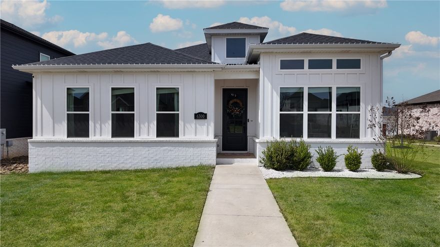 Welcome to this stunning 4-bedroom, 3-bath residence located in the highly sought-after Aurora neighborhood in Bentonville. This home showcases beautiful quartz countertops, luxury vinyl plank flooring, and a spacious kitchen featuring an oversized island and walk-in pantry—perfect for entertaining or everyday living.
The open-concept layout and split floor plan create a comfortable flow while still giving everyone their own space. Spacious walk-in closets and thoughtfully designed living areas add to the home’s everyday comfort. With modern finishes and stylish touches throughout, this home offers the perfect balance of luxury, functionality, and easy living.