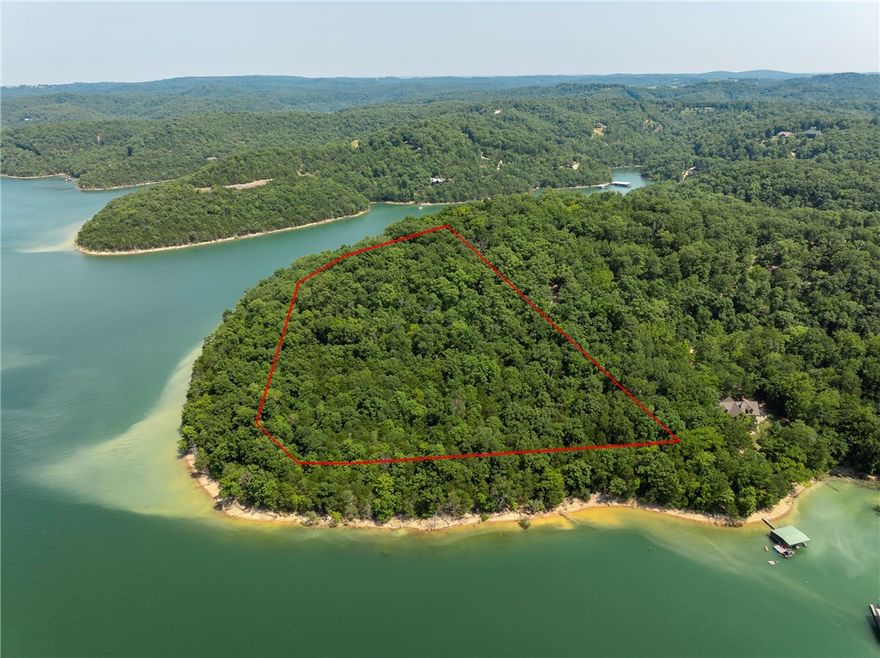 2000 ft of lake frontage. Awesome lake views from this hillside property of the north clifty channel and toward the main lake channel. This mountain top property is near the upper end of the lake. 13.88 acres m/l wooded acreage. Property touches a private gravel road for access. the property Will require a well but there is a private water line is nearby. Great building sites, that are sloped steep and somewhat gentle. Private and semi-private wooded building sites. Winter views, or total view with clearing. Some nice hardwoods on the property. Adjacent to oak ridge park subdivision. The closest marians are starky and lost bridge. A survey is attached. Enjoy sunrises and sunsets. The property is apx a 15 minute drive from Eureka Springs for ease of shopping and entertainment. First time on the market since the development of Beaver Lake. Has been in the family since that time. Pretty much untouched.
