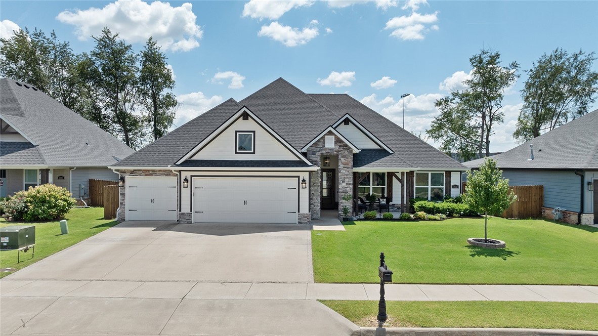 Custom-built in 2019, this 2,610 sq ft Craftsman-style home blends timeless design with thoughtful upgrades throughout. Featuring 3 bedrooms, 2.5 baths, and a bonus room, the layout is ideal for both everyday living & entertaining. The open-concept living area offers a built-in wet bar, indoor / outdoor fireplaces, and a seamless flow to the covered back porch &extended flagstone patio. No rear neighbors ā the property backs up to Bentonville West High School ā ensuring privacy. The gourmet kitchen is equipped with leathered granite & quartz countertops, ceiling-height cabinets w/ glass inserts, pot filler, & a large walk-in pantry. The oversized primary suite boasts double shower heads in the luxurious walk-in shower. Additional features include a laundry room sink, plumbed gas line for fire pit, pre wired for hot tub, extra garage lighting, & abundant storage throughout. Beautifully landscaped with walkability to Centerton Gamble Elementary & BWHS make this home a rare find in the heart of Centerton.