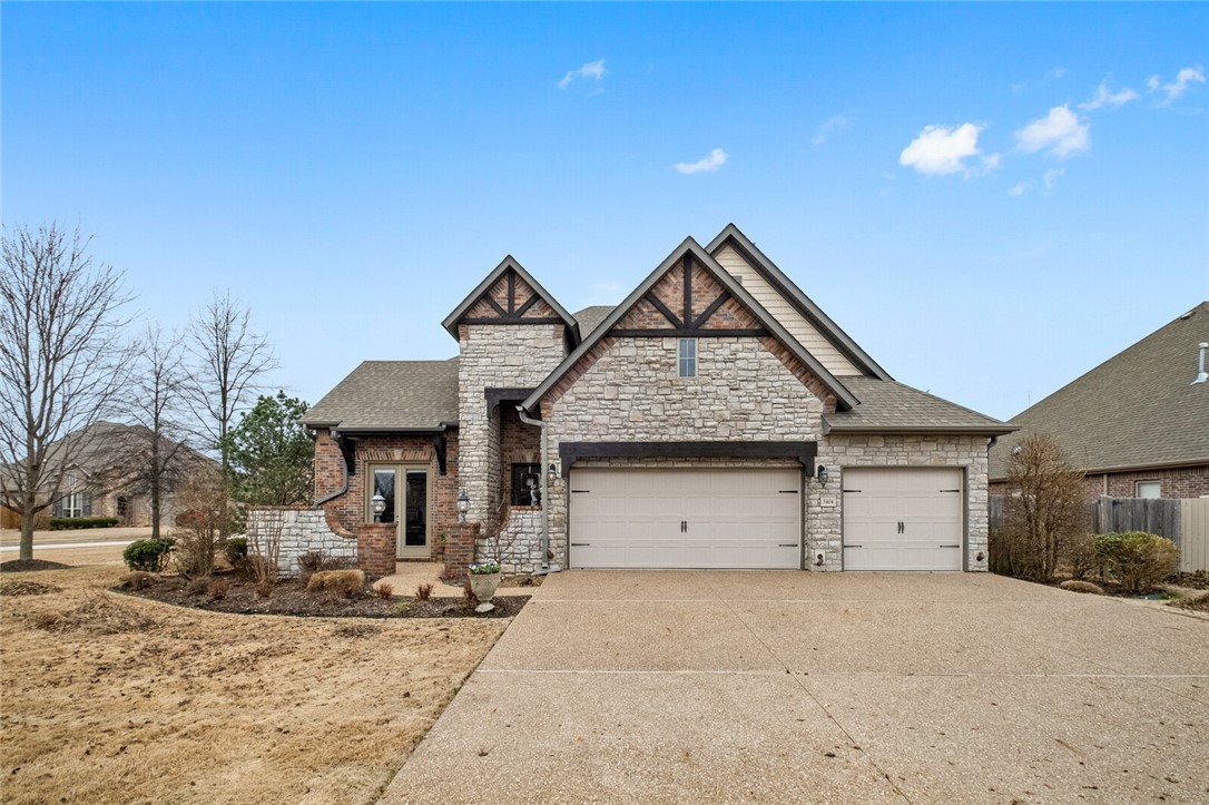 Prime Location!! This Parade of homes multiple award winner, former Central Park Model Home has perfect blend of modern design for comfortable living. Great curb appeal & endless upgrades with
all 4 bedrooms & 3 full bath on main floor. Upstairs oversized bonus room, half bath, walk-in closet &
easy access to attic. With spacious open-concept living area, semi open formal dining & gourmet
kitchen, walls of windows overlooking professionally landscaped yards, extended covered
patio with built in grill & cozy fireplace, this home is perfect for entertaining. Primary bedroom is a
true retreat, with an en-suite bath featuring a soaking tub, walk -in shower & double vanities.
Front bedroom/office has access to private courtyard. Home sits on a 0.38 acre corner lot
surrounded by 4 Bentonville schools. Welcome Home!!
