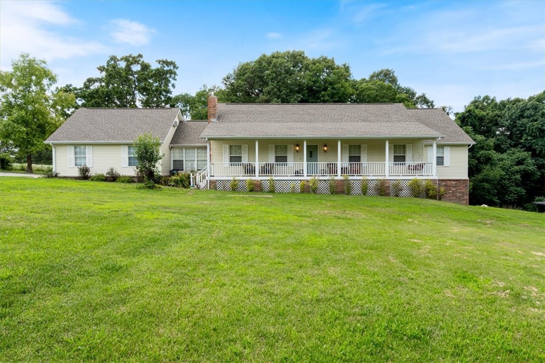 Exceptional home that spans 3,113 sqft on a 4.62-acre lot. Living area features high ceilings and windows that flood the space with natural light. Bonus room over the garage and a 448 sq ft walkout basement below the main bedroom with a garage door that has water and electric in it. The kitchen boasts custom cabinetry and granite countertops for meal prep and entertaining. The primary bedroom is a true sanctuary with its ensuite bathroom complete with a soaking tub, separate shower, dual vanities and huge walk in closet. Whole home central vac. Attached is a 600 square foot apartment offers versatility for extended family, a home office, or rental income featuring one bedroom, one bath and full kitchen. Outside, enjoy the tranquility of your expansive property which includes a large 34x26 shop with garage door for all your hobbies and storage needs, a garden shed, and a garden area for cultivating your favorite plants. New leaf gutter protection. Relax on the screened-in back porch with a cup of coffee or tea!