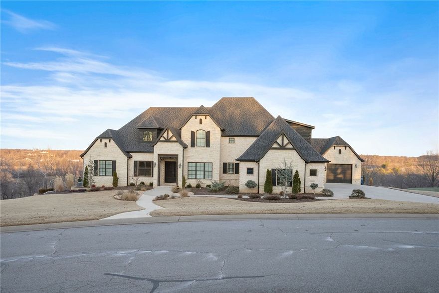 Nestled w/in the exclusive, gated Beau Chalet s/d, this immaculate estate w/extra lot offers unmatched style & panoramic views. Step through double doors into a welcoming foyer. To your left, a sophisticated office w/beamed cathedral ceilings; to your right, an elegant dining room. Straight ahead, the living room captivates with large picture windows, coffered ceiling & gas f/p. The gourmet kitchen has high-end appliances & eat-in area. The outdoor living boasts a large deck w/outdoor kitchen, f/p w/gas starter, mounted TV -perfect for relaxing evenings or gatherings. Inside, the primary suite is a private retreat w/wood floors, gas f/p, spa-inspired ensuite & large walk-in closet. The main floor includes 3 add’l bedrooms, 2 full baths, powder room & laundry room. Upstairs, discover more living space: bonus room, media room w/wet bar, fifth bedroom w/ensuite & add’l half bath. Other features include underground fencing, 4-car garage & countless premium finishes. Check the attachments for a full list!