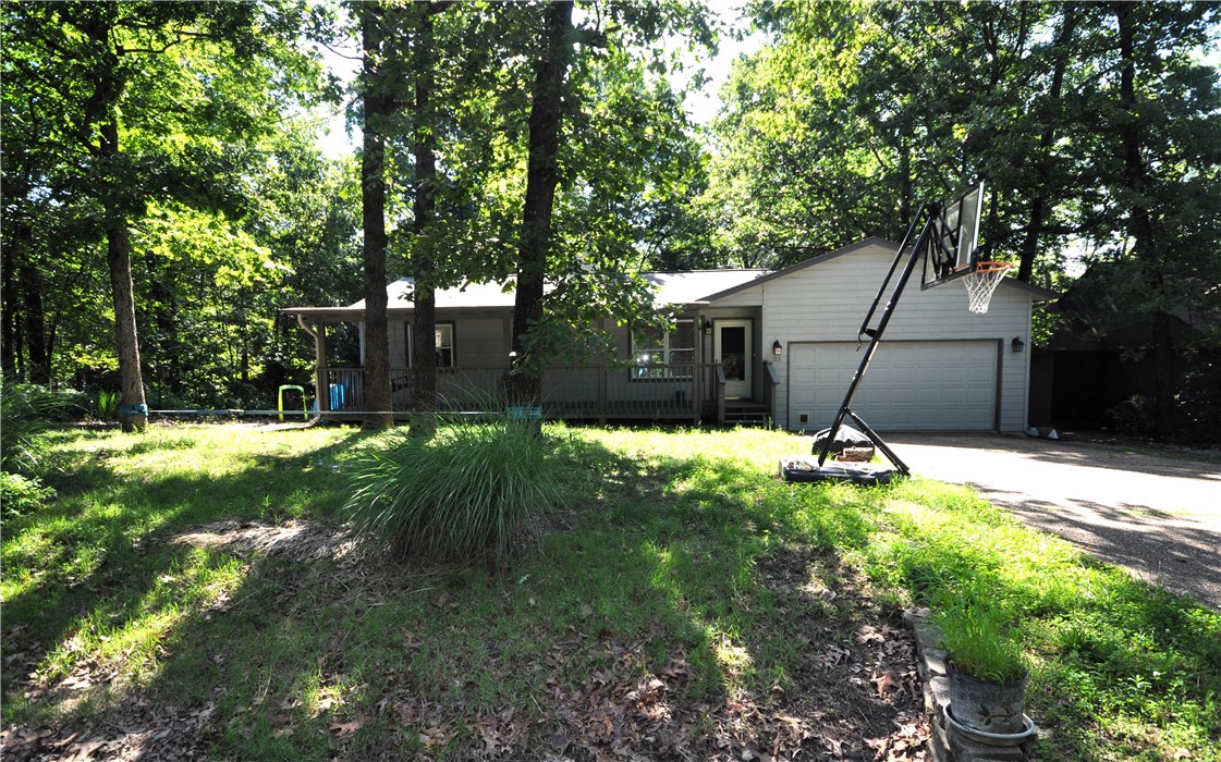 2 BR 2 Full Baths in this CUTE home. Near Greenway and Bike Trails. Blowing Springs is at the end of the street. Vinyl laminate flooring throughout. Storage under the house. Nice back yard with chain link fencing with blueberries, blackberries, asparagus, and strawberries. Deck on the back and covered porch on the front of the house.