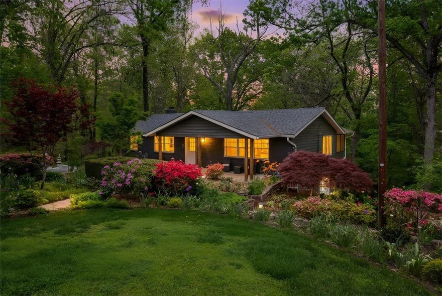 Rogers is calling........answer it here. This spacious 4-bedroom, 3-full-bath home sits on a double lot totaling 1.53 acres with two living spaces and room to breathe. Steps from Lake Atalanta with a direct path to the water, it delivers on every front: fresh paint inside and out, professional landscaping, new roof and gutters, updated secondary bath, double decks, screened porch, and a serene wooded yard. Turnkey and ready. Come see the hype for yourself.