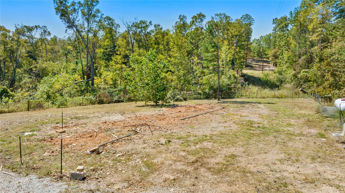 Welcome to your peaceful retreat! This 1.78-acre parcel of land, nestled in the heart of nature and surrounded by the serene beauty of Hobbs State Park, offers the perfect blend of tranquility and opportunity. Current septic is suitable for a 2-bedroom home, this land provides endless possibilities. With no deed restrictions, mobile homes are welcomed, giving you the freedom to create your ideal living space.
Enjoy the natural beauty and adventure of nearby War Eagle Cavern on Beaver Lake and the historic War Eagle Mill, both just a short drive away. Whether you're an outdoor enthusiast or looking for a quiet escape, you'll love the abundance of hiking trails throughout the area, allowing you to immerse yourself in the stunning surroundings. This property is ideal for those seeking privacy and the peaceful lifestyle that comes with being surrounded by nature.
Don't miss out on this rare opportunity to own a slice of serene paradise!