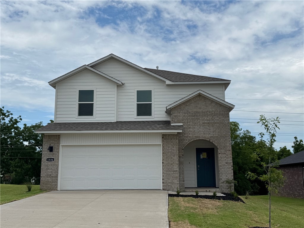 The Gorgeous Garfield plan in Nature Walk, located in Springdale! These brand-new homes will have a brick and HardieĀ® siding exterior! This plan offers 4 bedrooms and 2.5 baths! Living room will showcase a beautiful and modern Electric Fireplace with Poplar Mantle and a ceiling fan. This home will have LVP downstairs and Carpet on the stairs and in all upstairs living areas. The kitchen features 36-inch cabinets, lovely appliances and quartz countertops and tile backsplash. The primary bedroom has a fabulous ensuite, dual sinks, with a walk-in shower with tiled walls. LED lighting throughout. High efficiency AC with programmable Wi-Fi thermostat. Front, side, and PARTIAL back sod for the larger lots. Come find your dream home today! Taxes and Parcel TBD. Garage Door Opener!