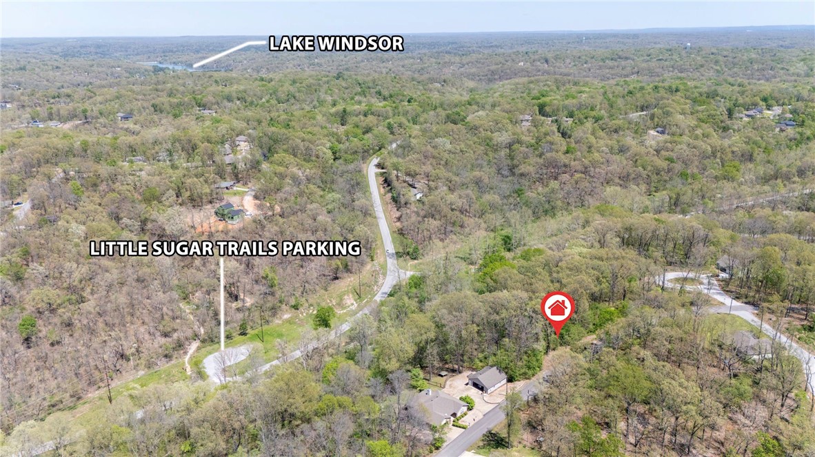 Great lot for a walkout basement and just 3 minutes from Lake Windsor. Little Sugar Trail is practically in the back yard.