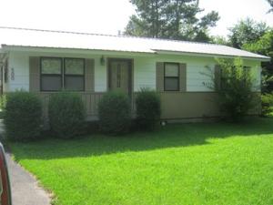 START SMART in this immaculate 2 bedroom home! You will fit right into this cute cottage. The third bedroom was transformed into a largelaundry room. Pretty lawn with spacious backyard! Close to the university-- this would also make a great rental! Metal roof, double carport, newcarpet in LR!