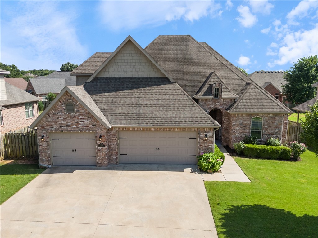 Wonderfully updated home nestled on a beautiful quarter acre lot in the desired location of Quailridge subdivision and Bentonville school district.
This home has new quartz countertops, new floors throughout, newly painted walls and cabinets, renovated fireplace and more. On the main level you'll find the Primary bedroom, 3 guest bedrooms and 3 bathrooms. On the upper level you'll find a second family room with a full bath and a bonus room or 5th bedroom. The neighborhood features a community pool, two parks, basketball court and a clubhouse. Just minutes from everything Bentonville has to offer. Come see why this should be your next home.