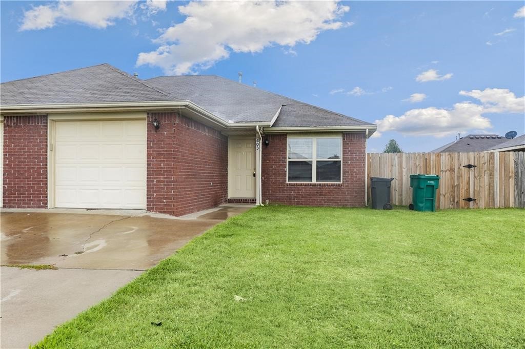 Nice 3 bedroom 2 bath duplex close to schools and 71 business. Plenty of room with open living room and kitchen, one car garage and a good size back yard. Refrigerator included. Pictures are similar but may not be exact. Credit and Background check required