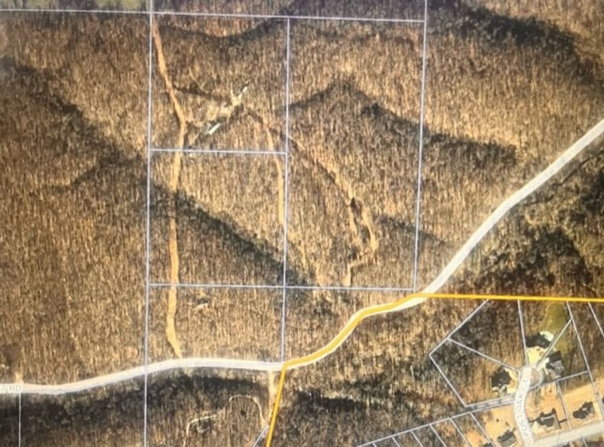 39.17 acres of prime land in Bentonville are awaiting your vision! Situated atop a hill, this land offers an exceptional opportunity for visionary developers or to create your secluded dream home, all within close proximity to the conveniences of town. With development activity flourishing in the Bentonville area, this is your chance to capitalize on the growing market demand. Near biking and hiking trails, this location is perfect for attracting eco-conscious buyers who desire an active lifestyle surrounded by natural beauty. Uncover the untapped potential of this prime land and transform it into the oasis of your dreams! All structures to be sold with property at no monetary value. Log Cabin & two sheds.