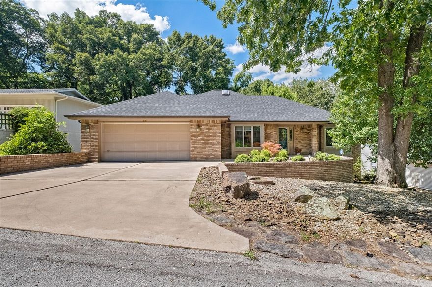 Welcome to your private retreat in desired Fenchurch neighborhood! This lovely open concept 4 bed, 3.5 bath brick home sits on a level, wooded lot with serene views and mature landscaping. Features include two living areas, a vaulted ceiling and cozy fireplace in main living, cathedral ceiling with skylight in kitchen, and a very versatile finished lower level—ideal for a living/media room, hobby space, or guest/apt suite. Huge living/media area, bedroom and full bath are downstairs. Three beds and 2 1/2 baths are on main level. Enjoy the screened porch, large deck with gorgeous wooded and nature views, golf cart garage, and amazing basement storage! Near Lake Windsor, Kingswood and Country Club golf courses, and all the other amazing Bella Vista amenities: several lakes, biking and hiking trails, pools, tennis, golf, Country Club and more. Near Back 40 & Gravity Zone trail systems, etc, for outdoor fun! Easy access to Hwy 71 & I 49 for quick commutes to Bentonville and Rogers. Schedule your showing today!