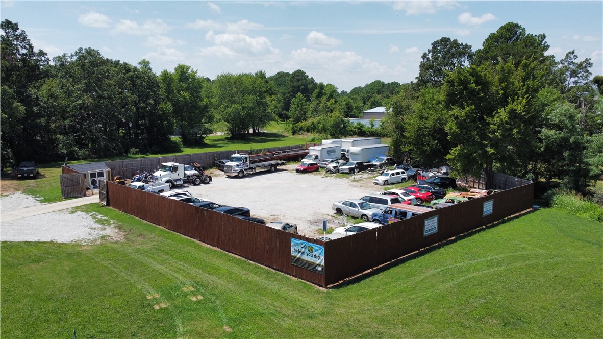 Two Lots totaling 2.87 acres. Located at the SouthWest Corner of Highway 412 and Klenc Rd. In Tontitown. Lots of Highway 412 frontage as well as access from Klenc Rd. Lots are prime commercial real estate. Possibilities are endless.