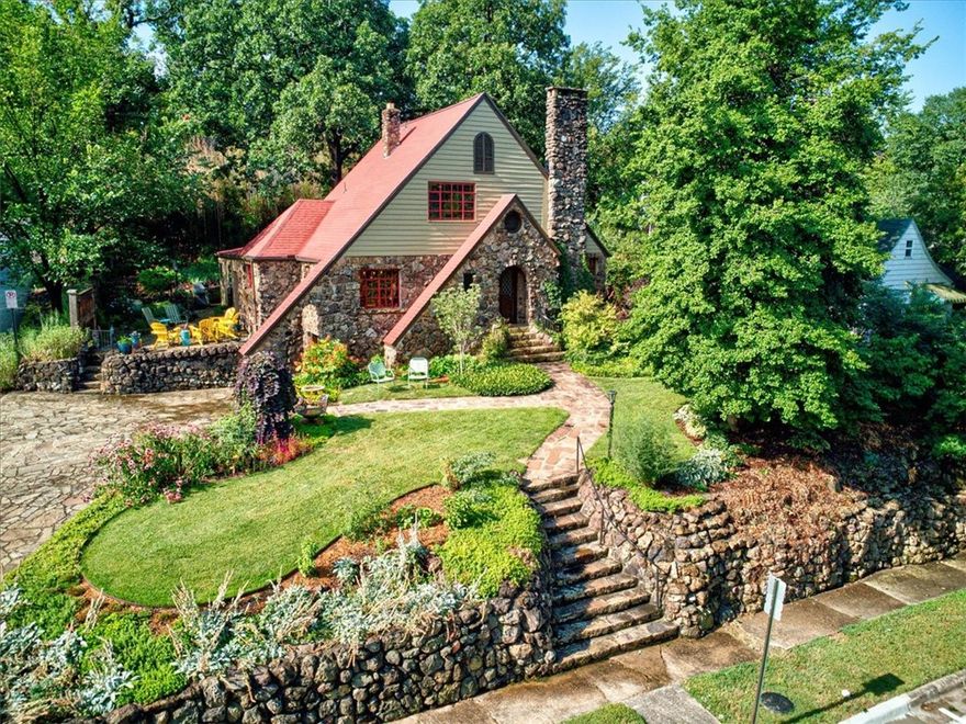 Beautifully unique home in Wilson Park Historic District. Built in 1926, this house boasts an incredible blend of vintage appeal & modern comforts. Preserved hardwood floors, windows, & doors are all original to the home. The primary bedroom upstairs is a core part of the home w/ a huge walk-in closet, other bedrooms are spacious & convenient. Additional rooms include an office/nook & a fully built-out 500 sqft basement which is heated & cooled. Location is key, in the heart of Fayetteville it is situated w/in a mile of the main amenities that Fayetteville has to offer, with walkable access to food, shopping, & entertainment. Perched atop a hill, this residence provides a quiet escape from the hustle of the city, offering a quiet retreat w/ great sunset views. Lush landscaping throughout the front & back yard can be enjoyed on the flagstone patio. Some notable amenities include three gas log fireplaces, built-in bookshelves throughout the home, classic arched doorways, art lighting & cedar-lined closets.