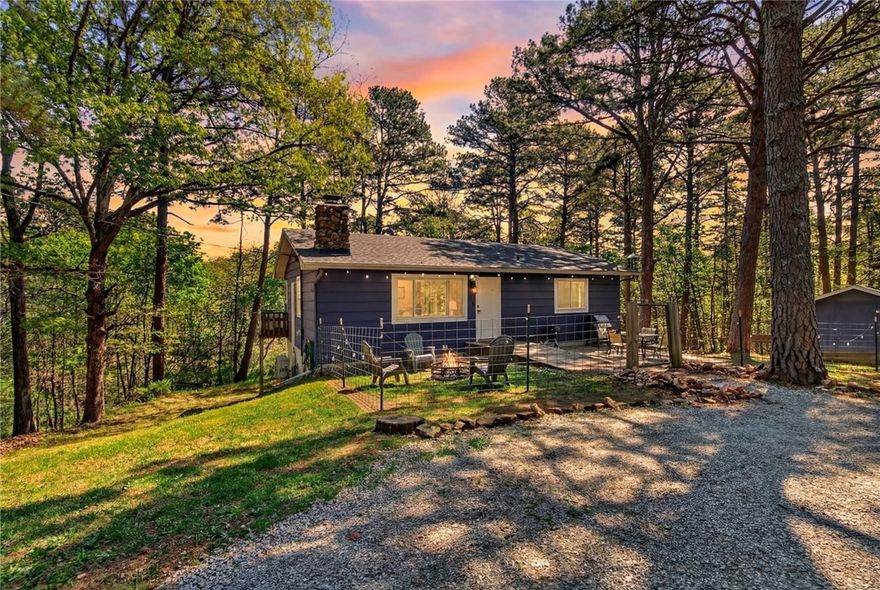 Secluded on 6 wooded acres just minutes from downtown Eureka Springs, this beautifully updated 2BR/1BA getaway blends privacy, comfort, and investment potential. Previously operated as an established short-term rental, the home offers a peaceful nature-retreat feel while still being close to shopping, dining, and everything that makes Eureka Springs so desirable. Inside, you’ll find a recently updated interior, and outside, key upgrades like an improved roof and triple mini-splits add value and peace of mind. A rare opportunity for buyers seeking a private residence, weekend escape, or STR-style property in a highly appealing location.