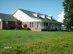 This home has 12 yr old HVAC, 3 year old roof. 5 miles from Subiaco Academy. Nice landscaping. 15 year old home. 2-Stocked ponds. Horse farm. Adjoins Corp of Engineers, close to AR River. Close to boat launch. Paved road. Nice driveway across pond dam. Double ovens in kitchen, ceramic tile floors, roof and HVAC are newer than home. Includes a detached metal shop that is 36'x24' with concrete floors and cabinets. Also includes metal barn that is 40'x50' with dirt floor.