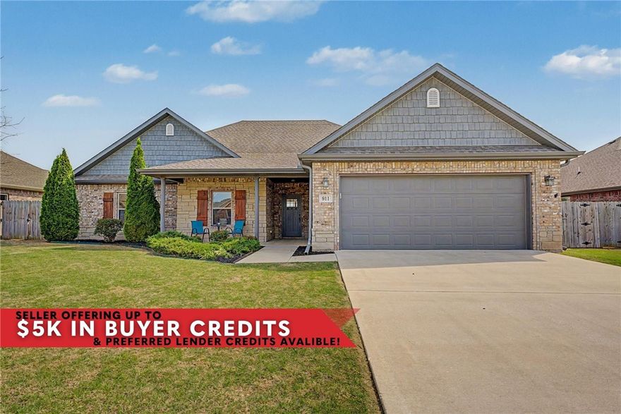This charming home features a landscaped front entry, freshly re-stained and sealed wood shutters and a spacious covered front porch. Inside, the living room offers wood floors, vaulted ceilings, and a tiled gas fireplace. The kitchen is designed for function and flow with an eat-in layout, coffee nook, ample cabinetry with 3 Lazy Susans, extra prep-space and granite countertops throughout. Primary includes crown molding, a tray ceiling, and a large walk-in closet. The en-suite features a jetted tub with tiled surround and a floor-to-ceiling tiled shower with glass door. Additional bedrooms offer natural light, walk-in closets with built-ins. Laundry room with upper cabinetry and utility sink. Step outside to a fully fenced backyard with a covered patio, 12x8 shed and a custom 445sqft stamped concrete addition, perfect for entertaining. 5 minutes to Prairie Grove Elem. & downtown, near parks/trails. Seller to credit up to $5,000 in closing costs with acceptable offer & ask about the $4,300 preferred lender credit!