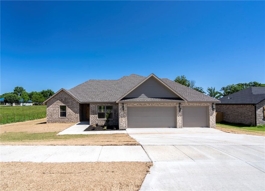 Seller offering a $5,000 credit towards closing costs! Welcome to your dream home nestled in a brand new subdivision! This modern, newly-constructed house sits on a sprawling 1-acre lot surrounded by peaceful, verdant scenery. This home boasts a 3-car garage with a split floor plan to ensure privacy and convenience for all. Greeted by the warmth of wood-look tile flooring, large vaulted ceilings, and sleek quartz countertops, the home also features a spa-like master suite with encompassing energy-efficient windows throughout the home that bathe the interior in natural light. The spacious, upstairs living room is a versatile space perfect for relaxation, entertainment, or a home office. The large, desirable backyard beckons for outdoor entertaining and leisurely moments. Don't miss the chance to make this home yours; where modern luxury meets the beauty of nature. Now featuring High-Speed Cox Internet! Property Taxes TBD.