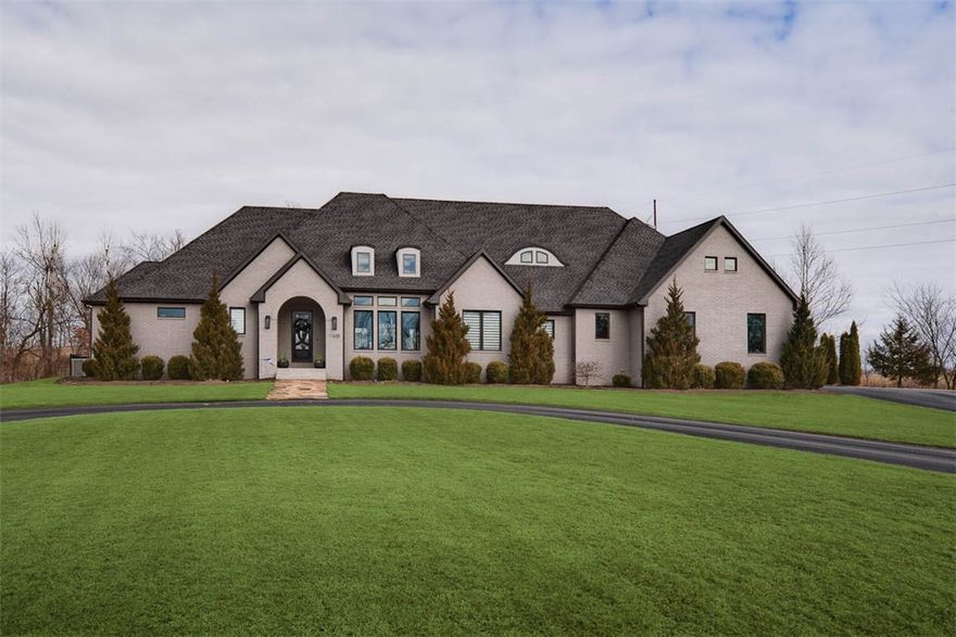 This custom built 2014 David Harris Construction home is not only a stunner, but also has attained the highest level of detail for maximum comfort and functionality. The property sits at the apex of a hill on over 5 acres of undisturbed tranquility. With clean, modern lines and open floor plan, an entertainer's dream kitchen, custom cabinetry, high tech surround sound systems inside and out, large walk-in pantry with coffee bar and fridge, 4 spacious bedrooms all with en-suite baths. The inside flows to the outside living area with a fireplace and overlooks the heated/cooled, self-cleaning, salt-water pool with fountain, and a cabana with a hot tub. Sit by the pool and be surrounded by the secluded and rolling vistas of our beautiful NW Arkansas, or enjoy the outdoor adventures of the 4- wheeler trails on your property. The property is very private, but is centrally located and only 7 miles to Pinnacle and XNA.