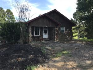 If you are looking for a great house on small acreage with several outbuildings and a large pond, this cute home is for you!! Home features 3 bedrooms, 2 baths, open living area/kitchen with woodburning stove. Outside is nice large workshop, portable garage, portable carports, barn and pole barn.Seller is Secretary of Veterans Affairs, seller does not pay customary closing cost or title policy, escrow fees, survey or transfer fees. POF or Pre-qual dated 30 days or less required with offer.Property was built prior to 1978 and lead based paint potentially exist