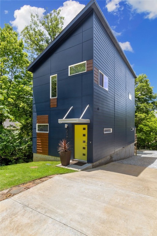Welcome to 239 N Fletcher Avenue, a beautifully designed two-story home nestled in the highly sought-after Mount Sequoyah South neighborhood of Fayetteville. Built in 2021, this 2-bedroom, 2.5-bath home offers 1,280 square feet of modern living space with an open-concept layout, abundant natural light, and quality finishes throughout. The kitchen features quartz countertops, energy-efficient stainless-steel appliances, and a spacious pantry, while the living room is anchored by a remote-controlled gas fireplace. Both upstairs bedrooms are private suites with walk-in closets and full baths. Additional highlights include a half bath on the main level and full-size laundry room. Outside, enjoy a deep backyard with a relaxing deck and off-street parking for two. Located just minutes from the Historic Downtown Square, Dickson Street, and the University of Arkansas, this home blends modern comfort with walkable convenience—perfect for anyone wanting to enjoy all that central Fayetteville has to offer.