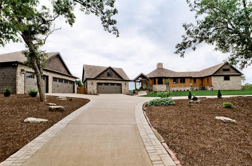 Exquisitely designed and built custom home with a prime location for views. This home features Craftsmanship with a capital C. From the beautiful hand scraped 3/4 hickory flooring to the finishing details, this home is filled with custom features too numerous to list. The owners also took into consideration the location for this masterpiece to be placed. They say "a picture is worth a Thousand words" so check out the pictures. This property is shown by appointment only! Don't let it get away, call today!