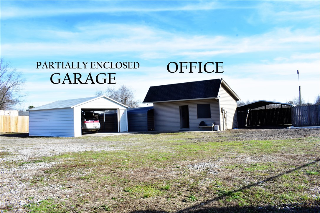 This is one of two commercial lots that can be purchased together or separately. Tract 3 features an office building that is well-equipped to meet both professional and personal needs. The property also has multiple carports, further enhancing its storage capabilities.