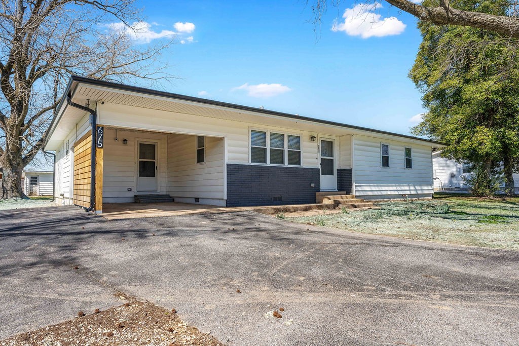 Welcome to your picture-perfect home in the heart of Pea Ridge! This charming residence offers the epitome of move-in-ready convenience, with every detail meticulously renovated for modern comfort and style. Houses are remodeled often, but hardly ever is this much detail put into a remodel. This home has a long list of upgrades that include all new HVAC system, plumbing, hot water heater, electric wiring, panel, outlets and switches as well as sound proofing insulation. New sheetrock, paint, cabinets, granite counters, fixtures and new hardware throughout inculding a new 450 sqft addition of a primary bedroom and en suite bath! Kitchen includes high end brand new stainless appliances. The laundry room is large enough to double as an office. Outside you will find all new roof & gutters, deck, privacy wall to carport and a hydro-seeded front and back lawn! You don't even have to worry about purchasing appliances! Refrigertor, washer and dryer are already here and completly brand new! Scan the QR code for a video