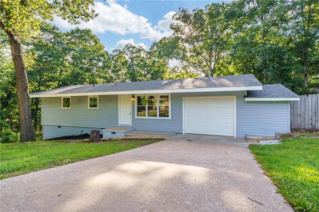 Do you want to live 200 feet from the 'Flo Ride' bike trail? You can NOW! Come see this 2 bed, 2 bath that has been completely remodeled and ready for it's new owners. What is there to love about this house....new windows, new floors, new sheetrock throughout, new paint, all new fixtures, plus we built a brand new back deck with backyard access. Over-sized garage is great for storage or a workshop PLUS more storage under the house. You'll be blown away at how LARGE this house LIVES. Come see it today!