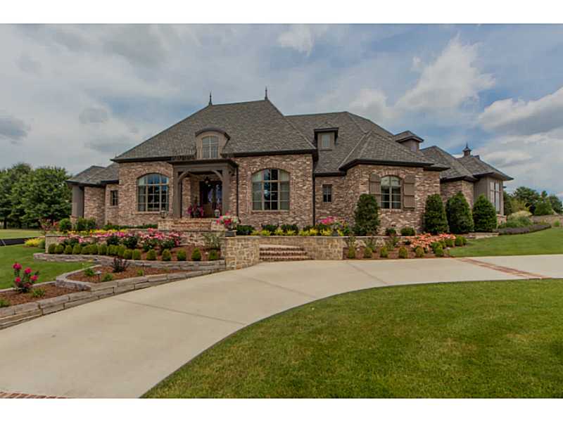 Exquisite French Country Estate built in 2013 by Mark Smith Construction on .98 acre lot in gated Pinnacle Country Club. This 6,535 sq ft home offers unparalleled quality with the finest fixtures and finishes. No expense spared with gorgeous walnut,hardwood flooring, designer lighting, barrel vaulted ceiling, custom millwork & built-ins throughout, home audio system, & wine room. Backyard oasis complete w/ heated gunite pool, lush landscaping & poolside cabana w/ stone fireplace & outdoor kitchen.