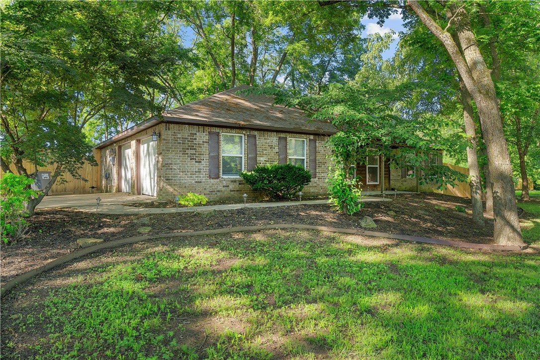 Located just minutes from Downtown Fayetteville, this upgraded home surrounded by mature trees offers proxmity to all the Fayetteville amenities coupled with small town living all within the highly sought-after Fayetteville School District. Mailing address is Fayetteville, Legal description is Elkins.
Brand new carpet, fresh interior paint, a new primary bath shower insert & toilet. Clean, tidy, and move-in ready.
Step outside to a newly built backyard deck, fully enclosed by a new 8-foot privacy fence and graced with generous shade trees. Perfect for morning coffee, and summer BBQ's. Roof is approx 5 years old.
Enjoy a scenic drive between this home and Downtown Fayetteville, just minutes to the University of Arkansas, shopping, dining, and medical. You'll apprecciate this smaller community offering the Elkins Sports Complex and nearby Lake Sequoyah. Benefit from the tranquility of this neighborhood without giving up easy access to Fayetteville’s lively downtown scene. Open House Sat 12-2
