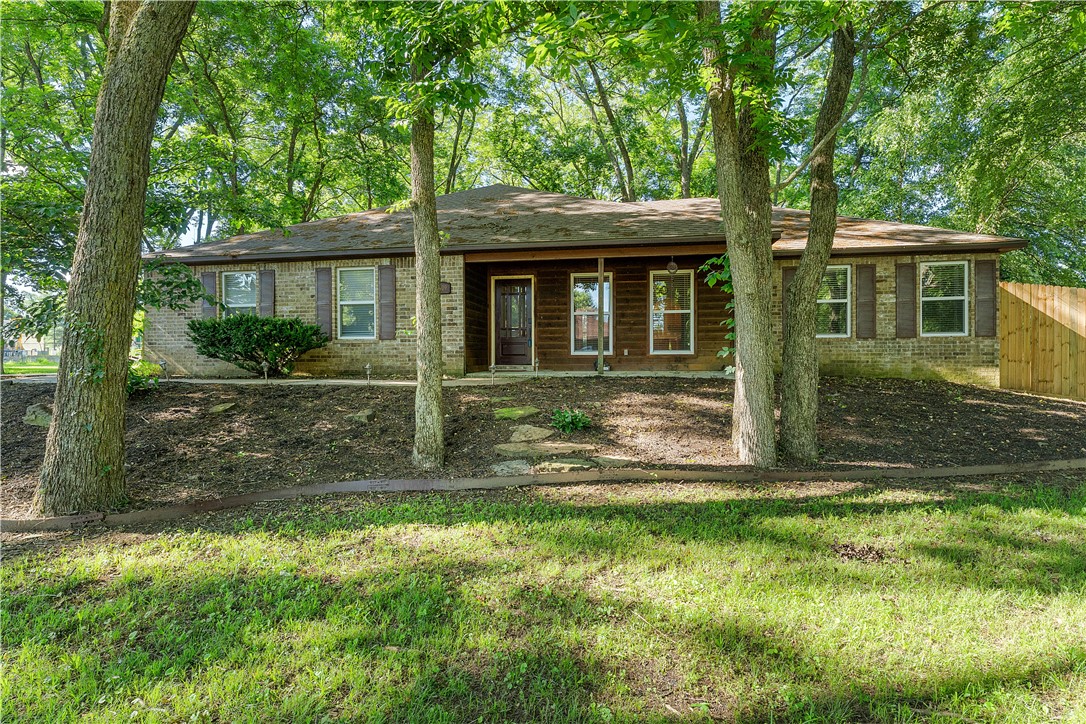 Located just minutes from Downtown Fayetteville, this upgraded home surrounded by mature trees offers proxmity to all the Fayetteville amenities coupled with small town living all within the highly sought-after Fayetteville School District. Mailing address is Fayetteville, Legal description is Elkins.
Brand new carpet, fresh interior paint, a new primary bath shower insert & toilet. Clean, tidy, and move-in ready.
Step outside to a newly built backyard deck, fully enclosed by a new 8-foot privacy fence and graced with generous shade trees. Perfect for morning coffee, and summer BBQ's. Roof is approx 5 years old.
Enjoy a scenic drive between this home and Downtown Fayetteville, just minutes to the University of Arkansas, shopping, dining, and medical. You'll appreciate this smaller community offering the Elkins Sports Complex and nearby Lake Sequoyah. Benefit from the tranquility of this neighborhood without giving up easy access to Fayetteville’s lively downtown scene!