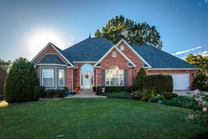 Gorgeous 2 level home w/ 3 living areas located in the Estates at the Harrison Country Club. The living room features high ceilings & a gas fireplace. French doors connect the living room w/ an all season sun room w/ an electric fireplace & high ceilings. A shared deck for the main level connects MBD and the sun room. A spacious master BD contains a fireplace and walk in closet with access to a master BA w/ Jacuzzi tub & shower. The kitchen features a new gas stove, granite countertops, and both a kitchen nook & formal dining area. House has beautiful crown molding, plantation shutters, & hardwood floors. Main level has 3 BD and 2 BA. Lower level has 1 BD & 1 BA as well as family game room w/ access to outside thru French door. Basement has workshop/1 car garage. Main level 2 car.