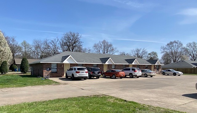Downtown Bentonville Development opportunity. .39 Acre lot. Lot Dimensions 102' X 166'. Currently fully leased 4 plex.