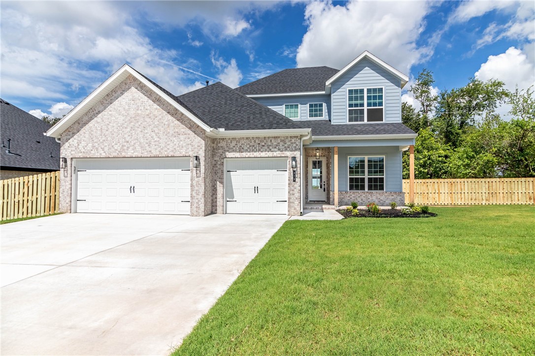 Smartly designed, new construction home with open floor plan! This 4 bedroom, 2.5 bath home includes a 3 car garage, gas fireplace, solid surface flooring in the living areas, ceramic tile in the wet areas, carpet in the bedrooms, granite counters throughout, and stainless steel appliance package! Exterior has professional landscaping, full gutters, privacy fenced back yard, and a covered back porch. Additional features includes low e windows, insulated garage doors, gas water heater, 2" faux wood blinds, and more! Come tour this property today!