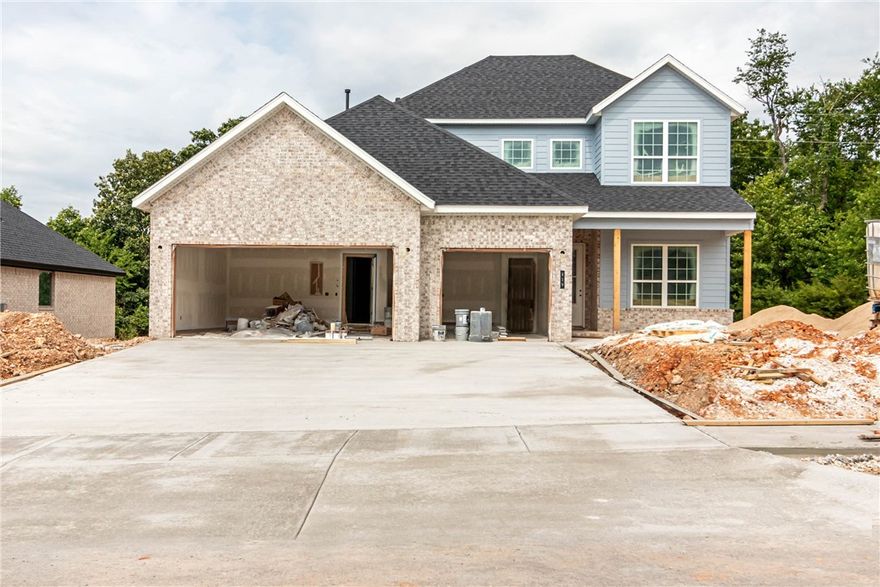 Smartly designed, new construction home with open floor plan! This 4 bedroom, 2.5 bath home includes a 3 car garage, gas fireplace, solid surface flooring in the living areas, ceramic tile in the wet areas, carpet in the bedrooms, granite counters throughout, and stainless steel appliance package! Exterior has professional landscaping, full gutters, privacy fenced back yard, and a covered back porch. Additional features includes low e windows, insulated garage doors, gas water heater, 2" faux wood blinds, and more! Come tour this property today!