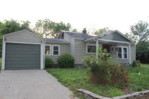 Plenty of opportunity with this 3BR/1BA home with remodeled kitchen, near level lot, storm cellar and 1 car garage. All #'s are approx., age is estimate, sq. footage per assessor. Property being sold ''As-Is''.