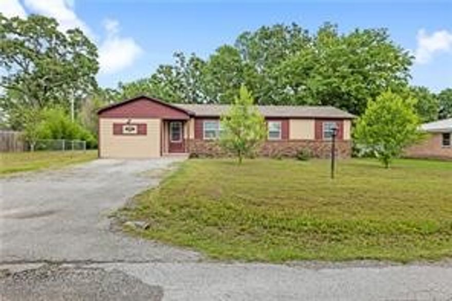 Updated ranch-style home with a large fenced backyard! This 3-bed, 2-bath home was remodeled in 2021 and features stainless steel appliances, custom oak cabinetry, and updated fixtures. Garage conversion created a spacious primary suite with a huge walk-in closet and private bath. Includes a backyard storage building plus a 14x20 heated, cooled, and insulated shop with electric. New A/C and ductwork in 2023. New HVAC in 2023 and water heater replaced within last 5 years. Refrigerator, washer, and dryer convey. Quiet street close to Gentry schools, parks, and shopping. Excellent starter home or investment property. Photos taken prior to furniture being placed.
