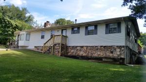 If you like a rustic/western theme, this home is for you! 4 bedrooms, 2 baths, above-ground pool with deck, gorgeous backyard with outside dining, screened back porch, spacious kitchen, and located so conveniently to downtown Harrison.